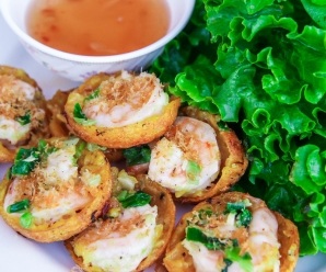 Eating Banh Khot In Vietnam